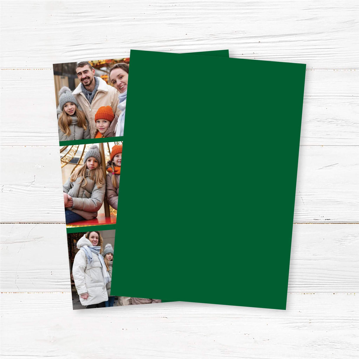 Customizable Joy Holiday Card featuring three photo slots alongside bold JOY lettering, with a festive holiday wreath as the “O” and a green snowflake background. - back.