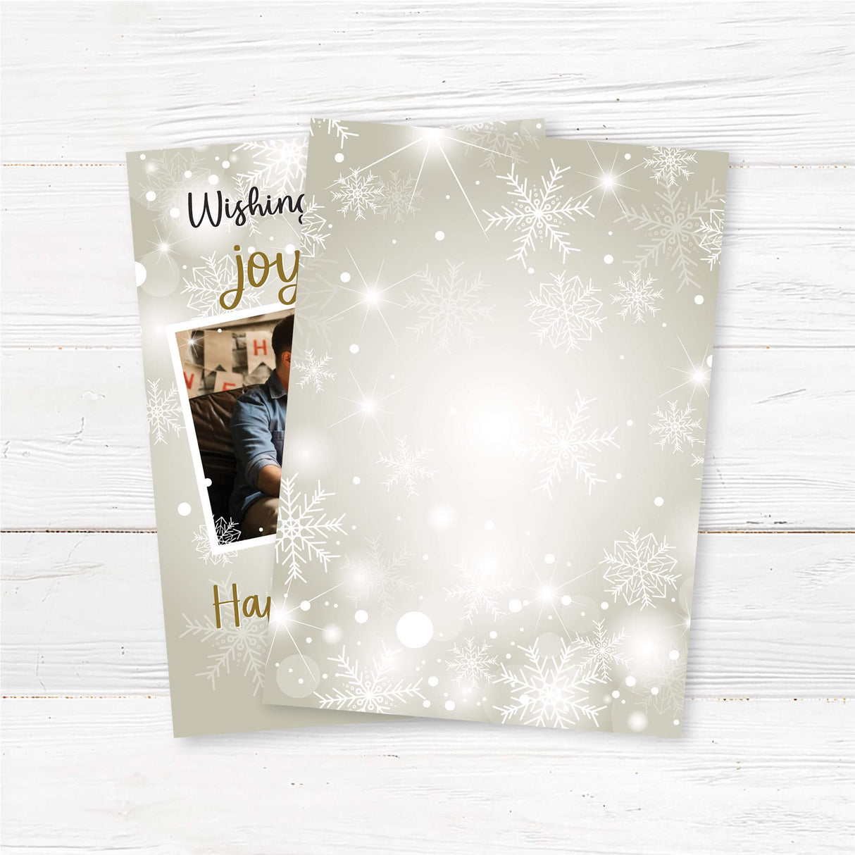 Personalized New Year photo card with snowflake design, featuring a family holding sparklers and “Wishing You Joy, Cheer, and a Happy New Year” greeting. back side