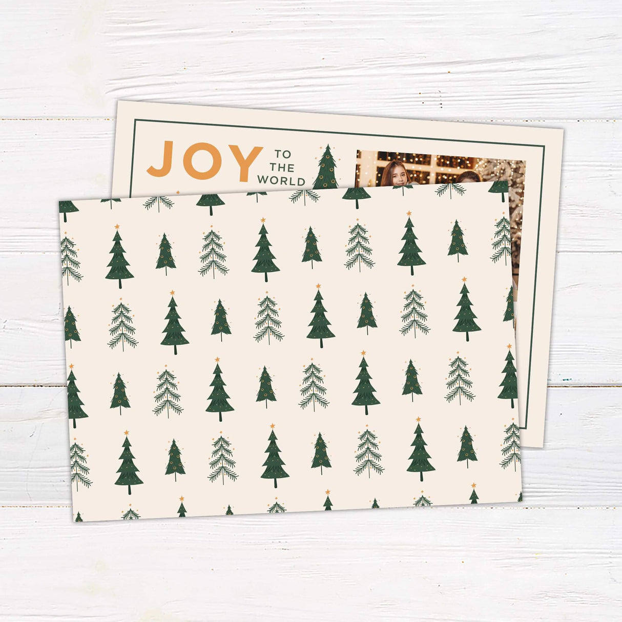 A customizable collage Christmas card featuring a modern layout with multiple photo slots, decorated with minimalist Christmas tree illustrations and warm festive typography. The design allows families to personalize their holiday greeting with their own photos while enjoying a clean, stylish, and festive look. - back.