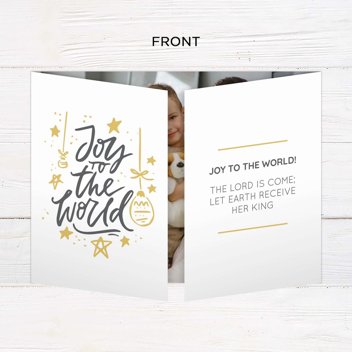 This gatefold Christmas card features a modern design with warm mustard yellow panels and playful white star illustrations. The card is fully customizable with your photos, names, holiday greetings, and year, making it a personalized keepsake for the season. - front.