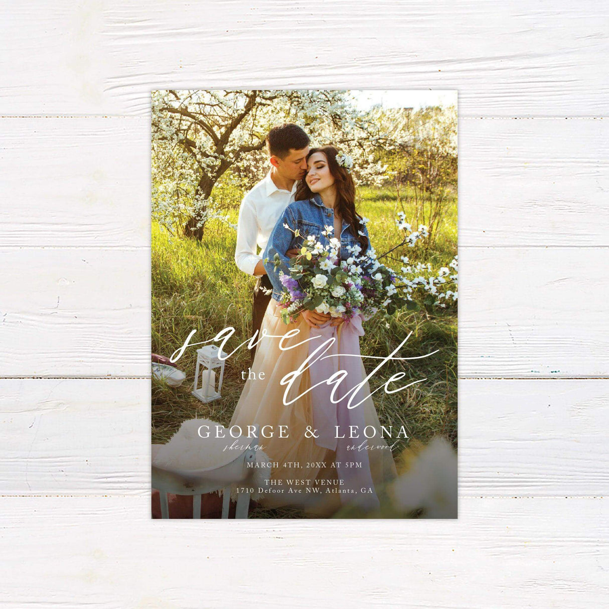 Photo Save the Date with beautiful script. Text is overlayed over the bottom of the photograph.