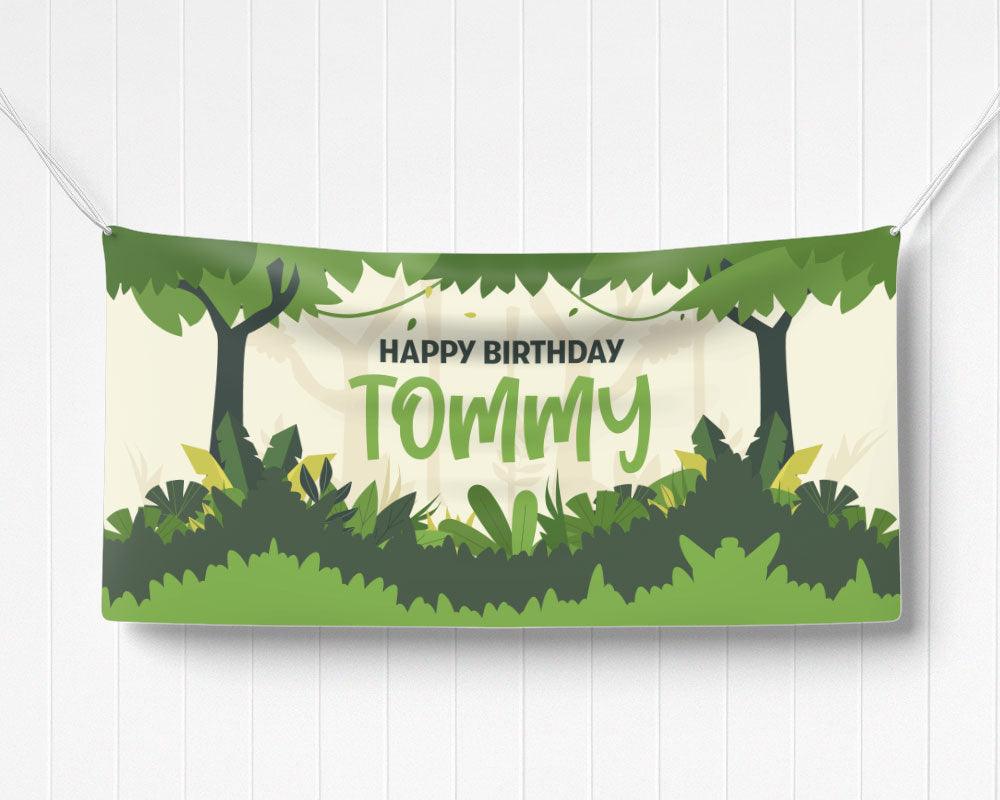Personalized jungle-themed birthday banner featuring vibrant green rainforest elements. Perfect for decorating a safari or adventure-themed kids' party.