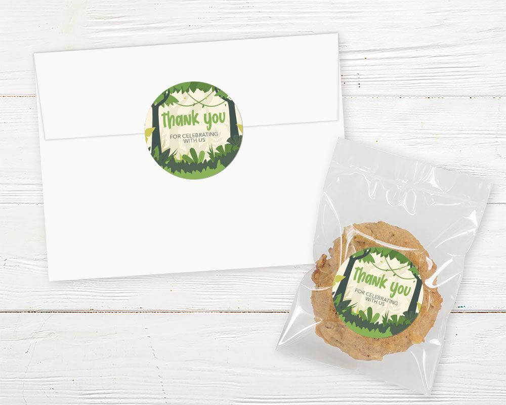 Jungle-themed party stickers featuring a tropical rainforest background and playful jungle typography. Great for favor bags, decorations, or envelope seals.