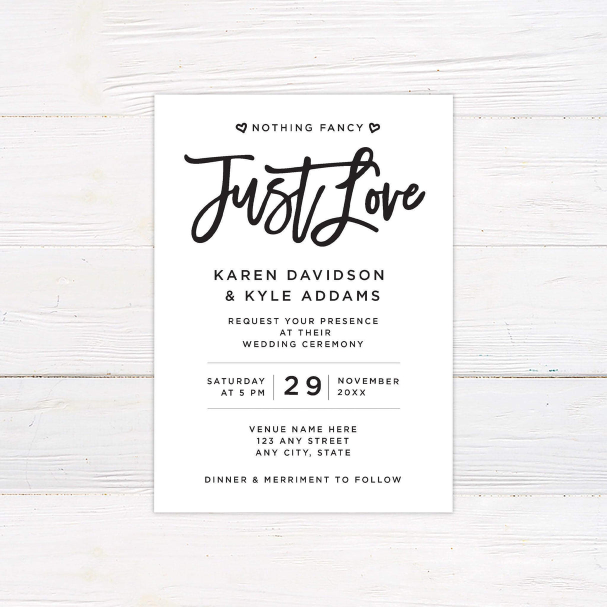 Minimalist black and white wedding invitation with “Just Love” script and modern typography.