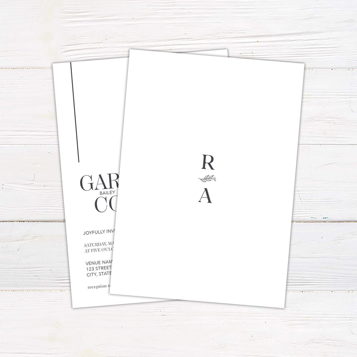 Minimalist wedding invitation with vertical date layout, elegant serif fonts, and black line art leaf illustration on a white background - back