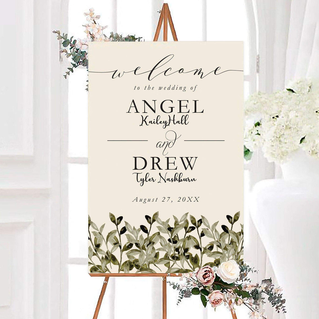 Leafy minimalist wedding welcome sign featuring a neutral background, elegant personalized typography, and a watercolor leafy greenery border along the bottom. The minimalist botanical design creates a natural and sophisticated greeting for wedding guests.