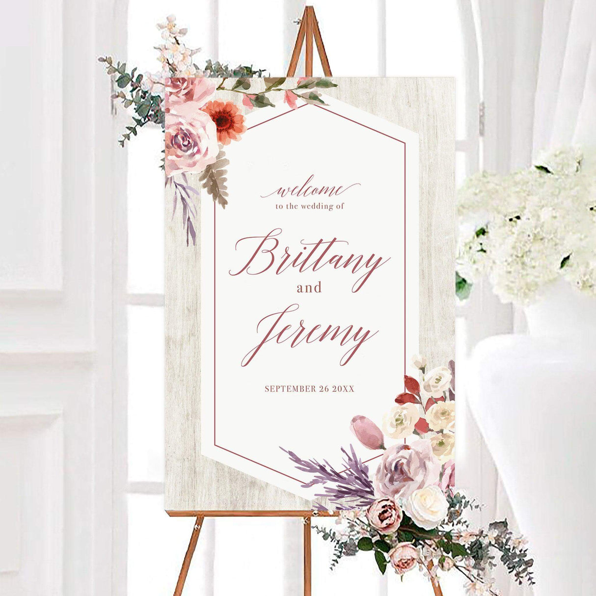 Lilac garden wedding welcome sign featuring blush, lilac, coral, and cream watercolor flowers with a thin geometric border and personalized script. A romantic garden-inspired design created to welcome guests to a wedding ceremony or reception.