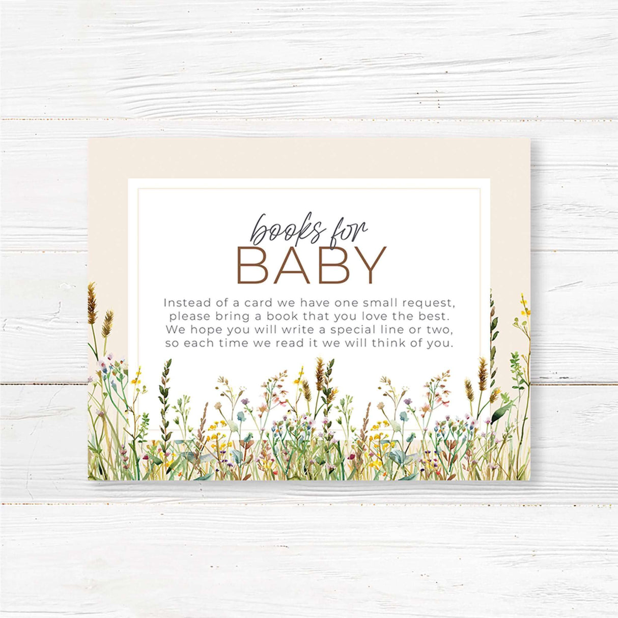 A small card with a soft, neutral background featuring a delicate floral or whimsical design. The text is in an elegant mix of script and serif fonts, kindly requesting guests to bring a book instead of a card for the baby. It may include a short poem or message explaining that the book will be cherished and help build the baby’s library. The design complements a baby shower theme with a warm and inviting feel."