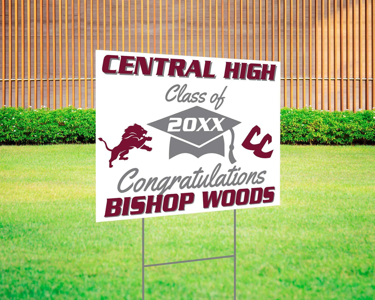 Graduation yard sign with bold text, custom school logo, class year, and congratulatory message. Features a large mortarboard cap graphic and varsity-style font. Printed on durable Coreplast plastic, perfect for outdoor display in front yards, driveways, and school events. Central High