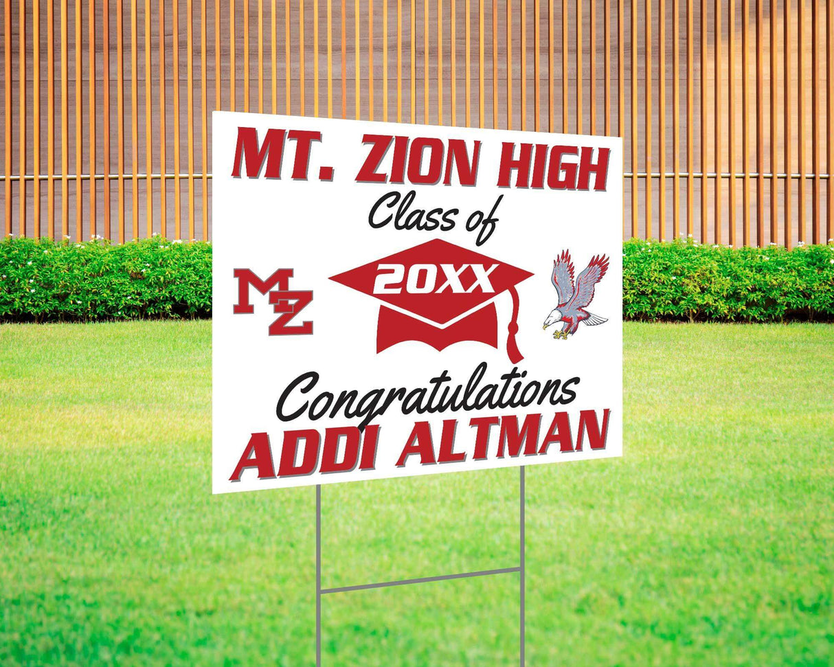 Graduation yard sign with bold text, custom school logo, class year, and congratulatory message. Features a large mortarboard cap graphic and varsity-style font. Printed on durable Coreplast plastic, perfect for outdoor display in front yards, driveways, and school events. Mt Zion