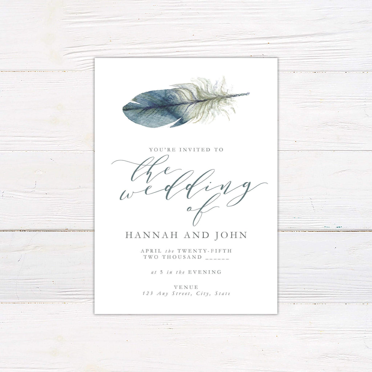 Minimalist wedding invitation with a watercolor feather and elegant script text.