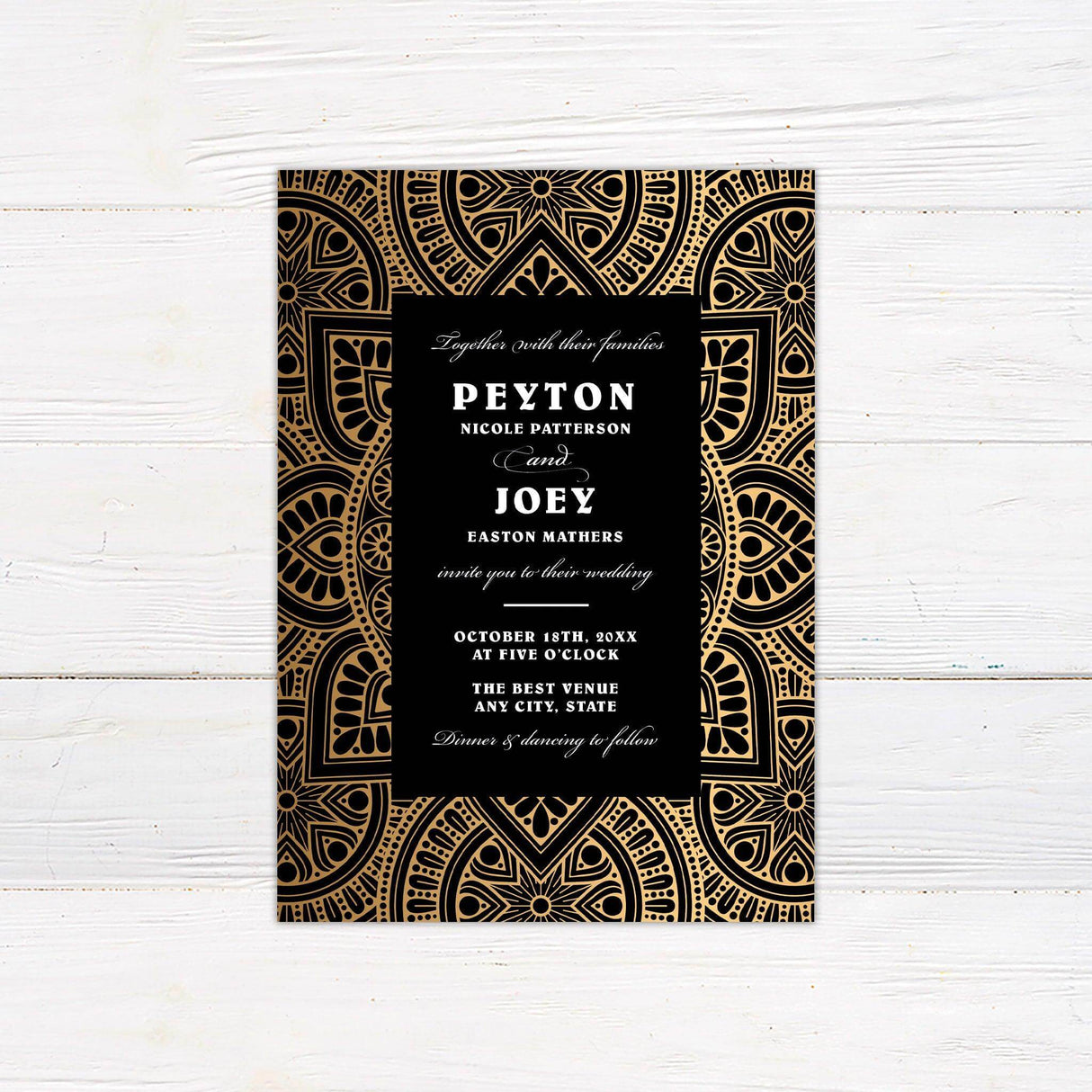 Wedding invitation with black background, ornate gold mandala border, and elegant centered white serif and script text layout