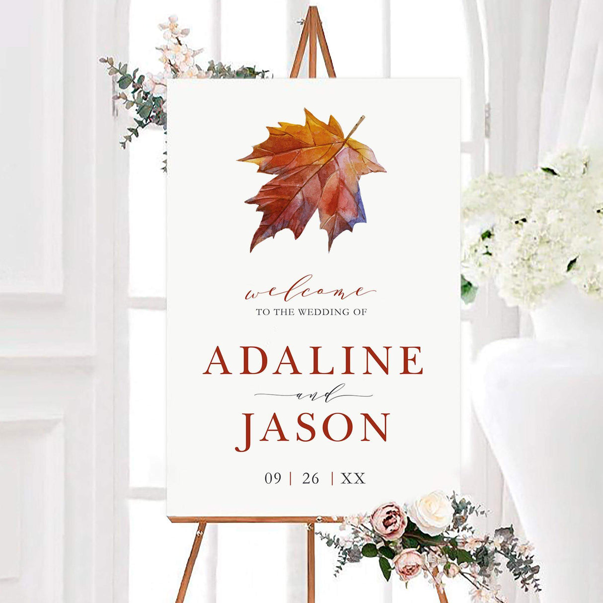 Maple leaf wedding welcome sign featuring watercolor maple leaves in warm autumn colors with elegant personalized typography. A seasonal fall wedding sign designed to welcome guests to the ceremony or reception.