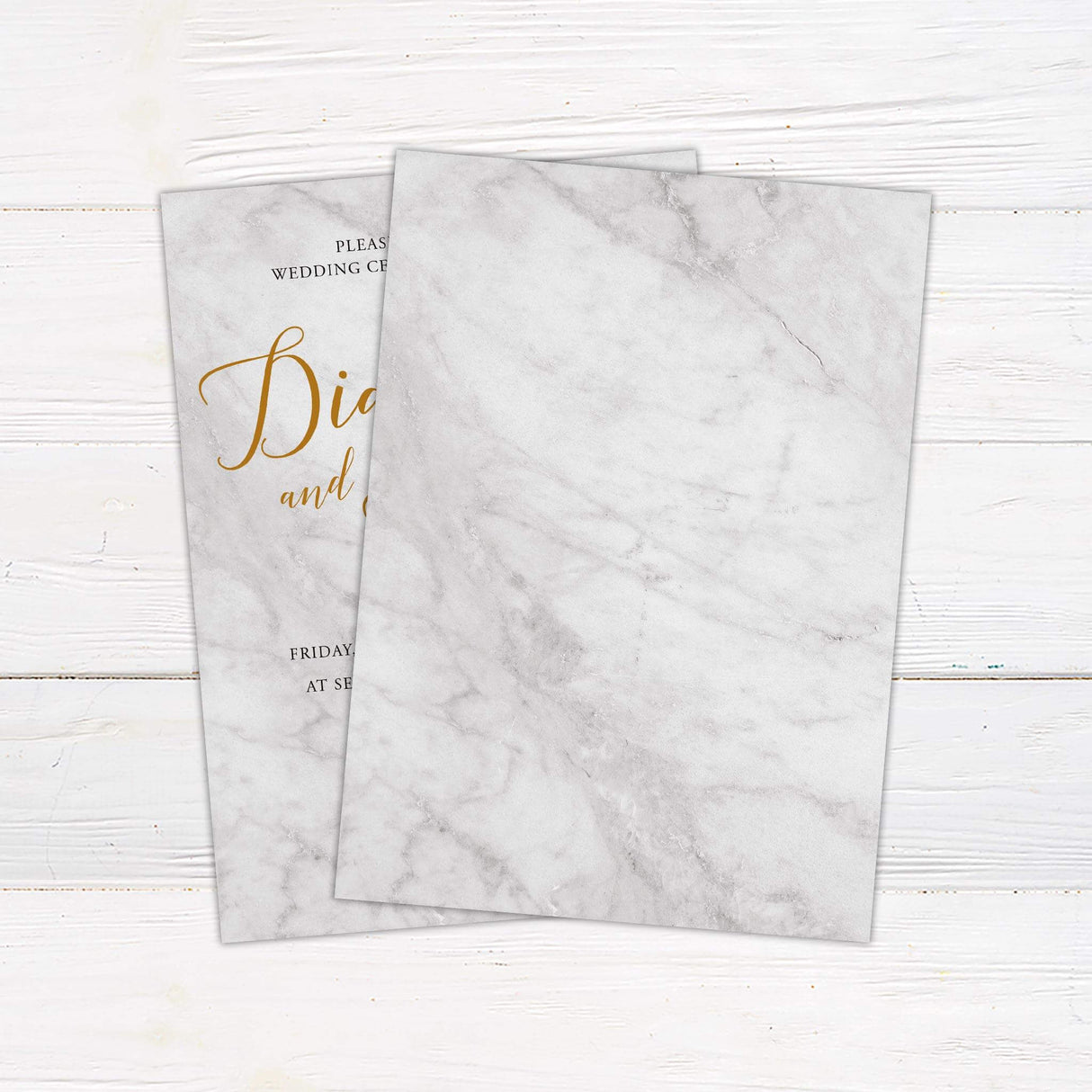 Wedding invitation with light marble background, elegant gold script names, and modern serif fonts for customizable event details - back