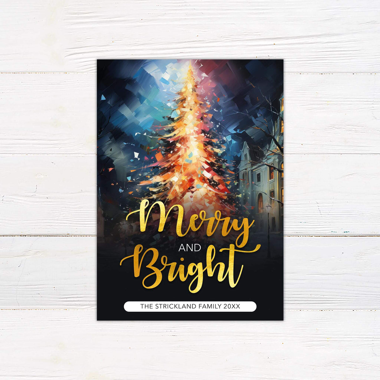 A holiday card featuring a glowing painted Christmas tree with the phrase “Merry and Bright” in golden script, designed for sending festive greetings.