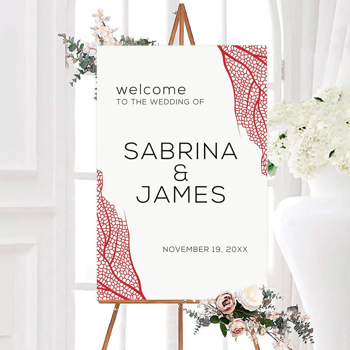 Minimal leaf wedding welcome sign featuring intricate red leaf illustrations, a white background, and modern black personalized typography. A bold botanical sign designed to welcome guests to a wedding ceremony or reception.