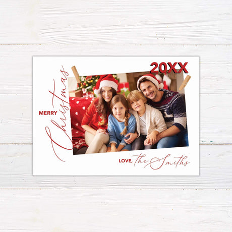 Minimalist red and white family photo Christmas card with clipped photo and handwritten Merry Christmas greeting