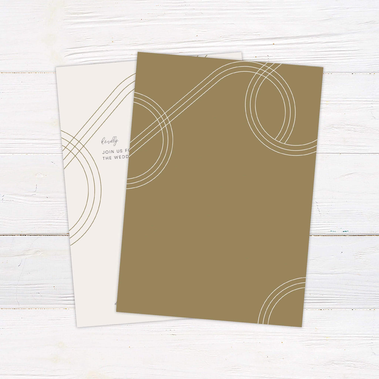 Minimalist printed wedding invitation with curved gold line design and modern typography on cream background - back