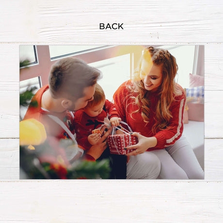 This is a gatefold holiday card with a minimalist pine design and a red and white color scheme. The front features a Christmas tree-shaped cutout framing a photo, while the inside displays festive greetings and space for personalized messages and images. - back.