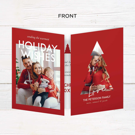 This is a gatefold holiday card with a minimalist pine design and a red and white color scheme. The front features a Christmas tree-shaped cutout framing a photo, while the inside displays festive greetings and space for personalized messages and images. - front side.