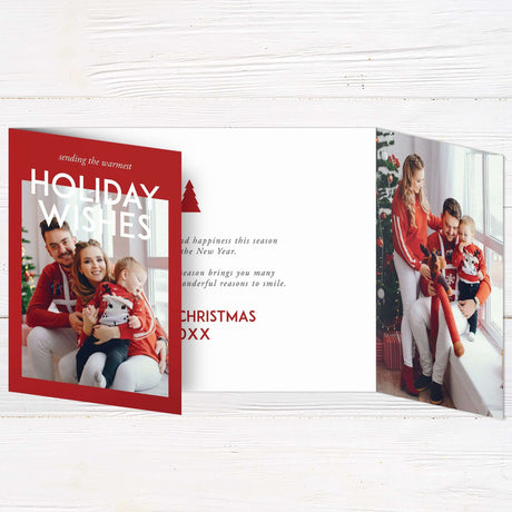 This is a gatefold holiday card with a minimalist pine design and a red and white color scheme. The front features a Christmas tree-shaped cutout framing a photo, while the inside displays festive greetings and space for personalized messages and images.