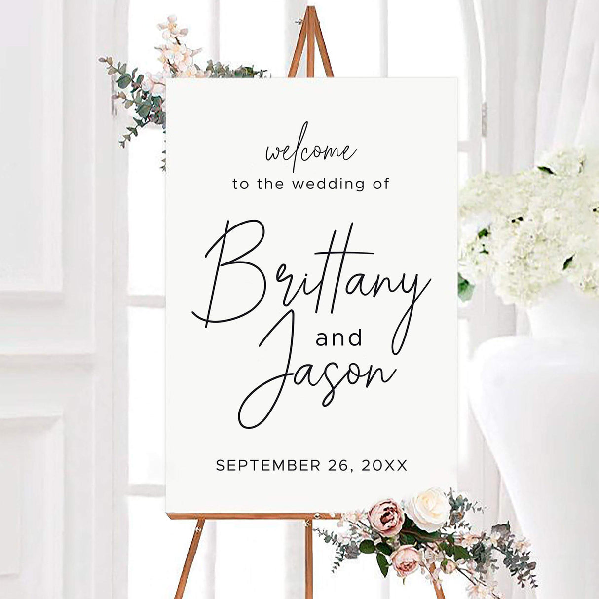 Minimalist script wedding welcome sign featuring elegant black script typography and personalized names on a clean white background. A modern wedding sign designed to welcome guests to the ceremony or reception.