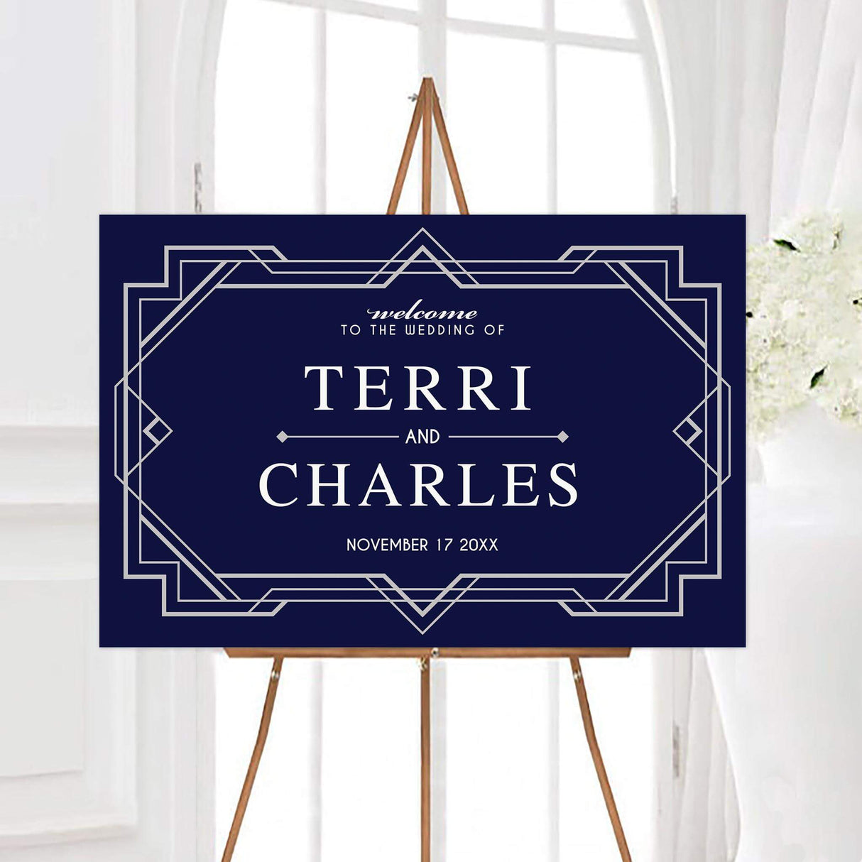 Modern deco wedding welcome sign featuring a bold geometric border, personalized couple’s names, and custom wedding date. The symmetrical design and classic typography create an elegant vintage-inspired look.