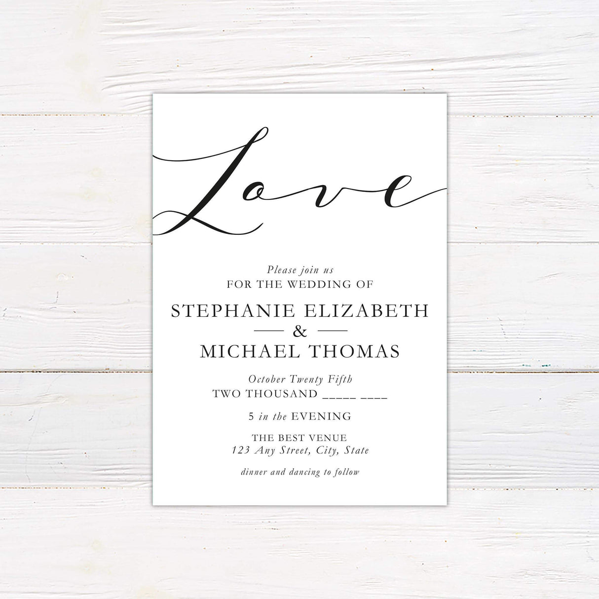 Black and white wedding invitation with large cursive “Love” at the top, modern serif fonts, and elegant wedding details layout