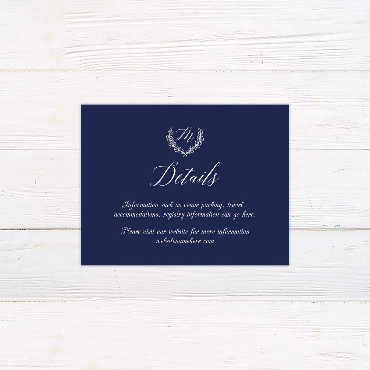 Wedding details card with a deep navy background, refined monogram crest, and elegant script. Perfect for sharing venue, accommodations, and event information in a sophisticated style.