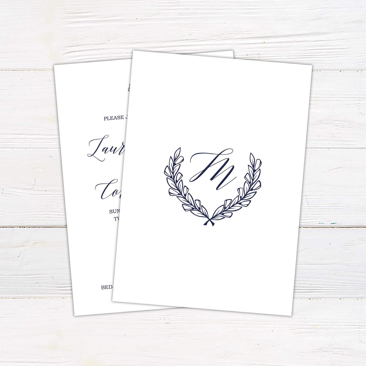 Elegant wedding invitation featuring a refined monogram crest and sophisticated script typography. A minimalist and timeless design, perfect for classic, formal, and luxury weddings. Back.