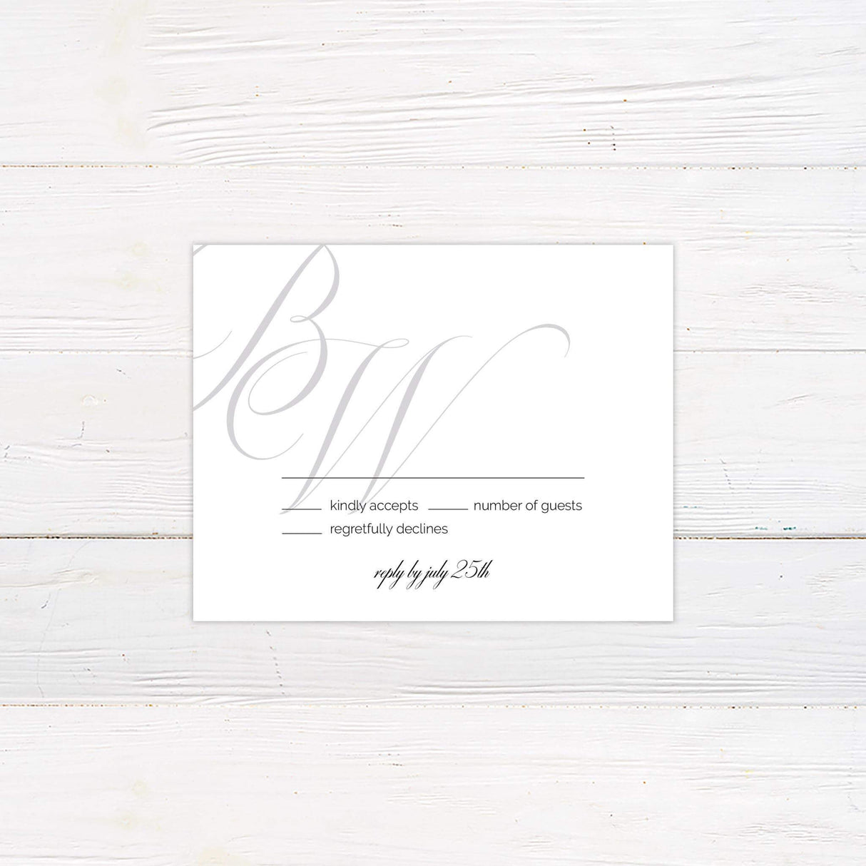 RSVP card with minimalist layout and elegant serif fonts, matching oversized monogram wedding invitation design.
