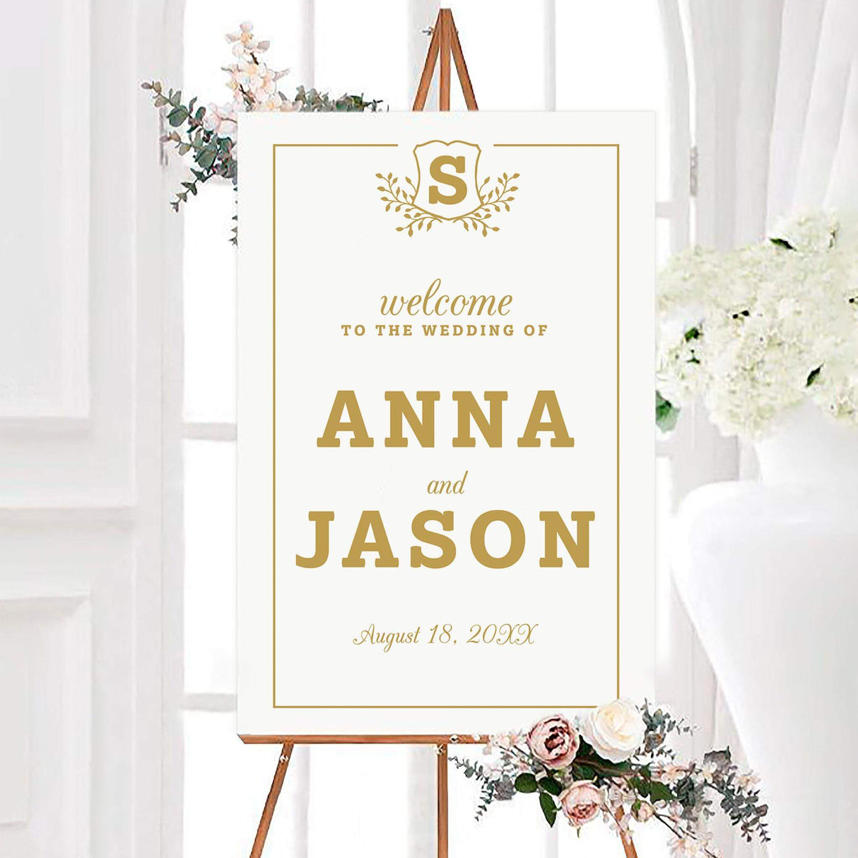Wedding welcome sign with gold monogram shield, serif fonts, and elegant layout, ideal for classic or traditional weddings.