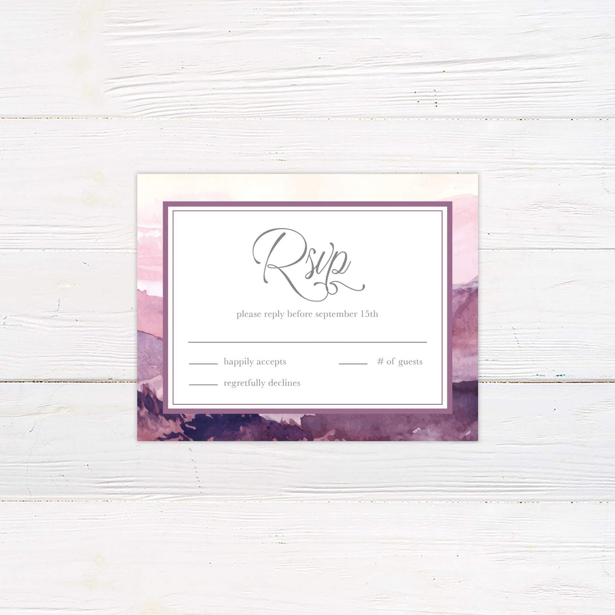 RSVP card with coordinating watercolor mountain dusk background and elegant serif and script fonts, matches outdoor wedding invitation suite.