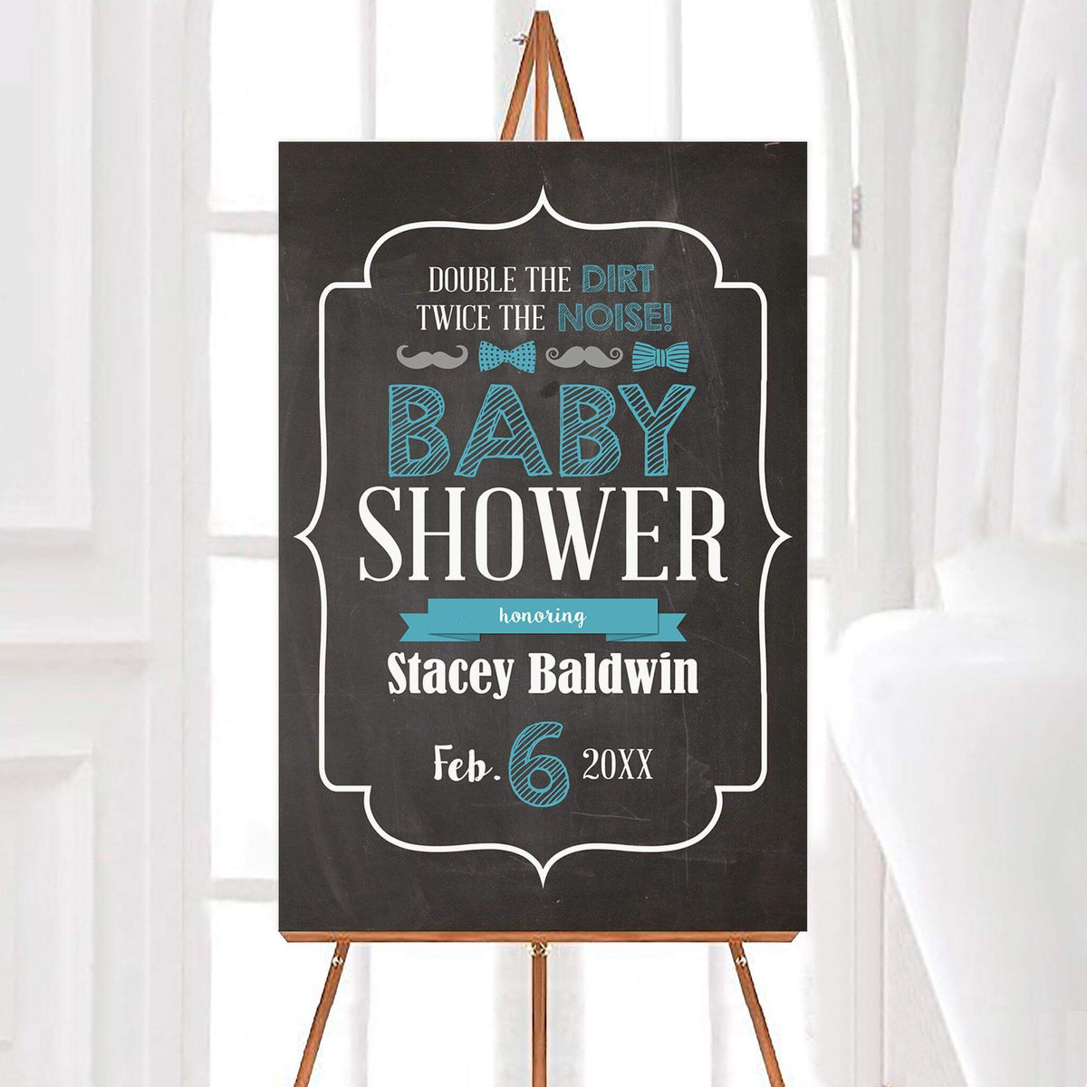 Personalized mustaches and bow ties twin baby shower welcome sign featuring a chalkboard background, blue bow ties, gray mustaches, and decorative white lettering. The design includes an ornate border, playful typography, and customizable guest of honor's name and event date.