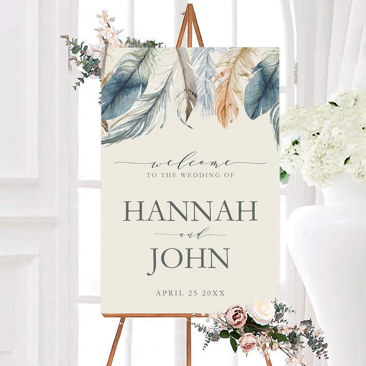 Natural feather wedding welcome sign featuring soft watercolor feathers in natural blue, sage, cream, and neutral tones. The personalized design includes the couple’s names and wedding date with elegant serif and script lettering.