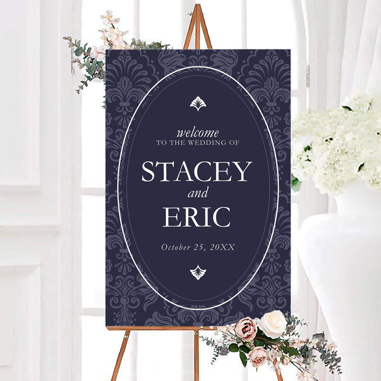 Elegant navy damask wedding welcome sign featuring a dark damask pattern, oval border, and classic white typography. The personalized design displays the couple’s names and wedding date.