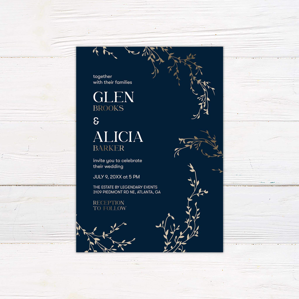 Navy and gold wedding invitation with elegant botanical branch illustrations and a modern mix of serif and sans-serif fonts