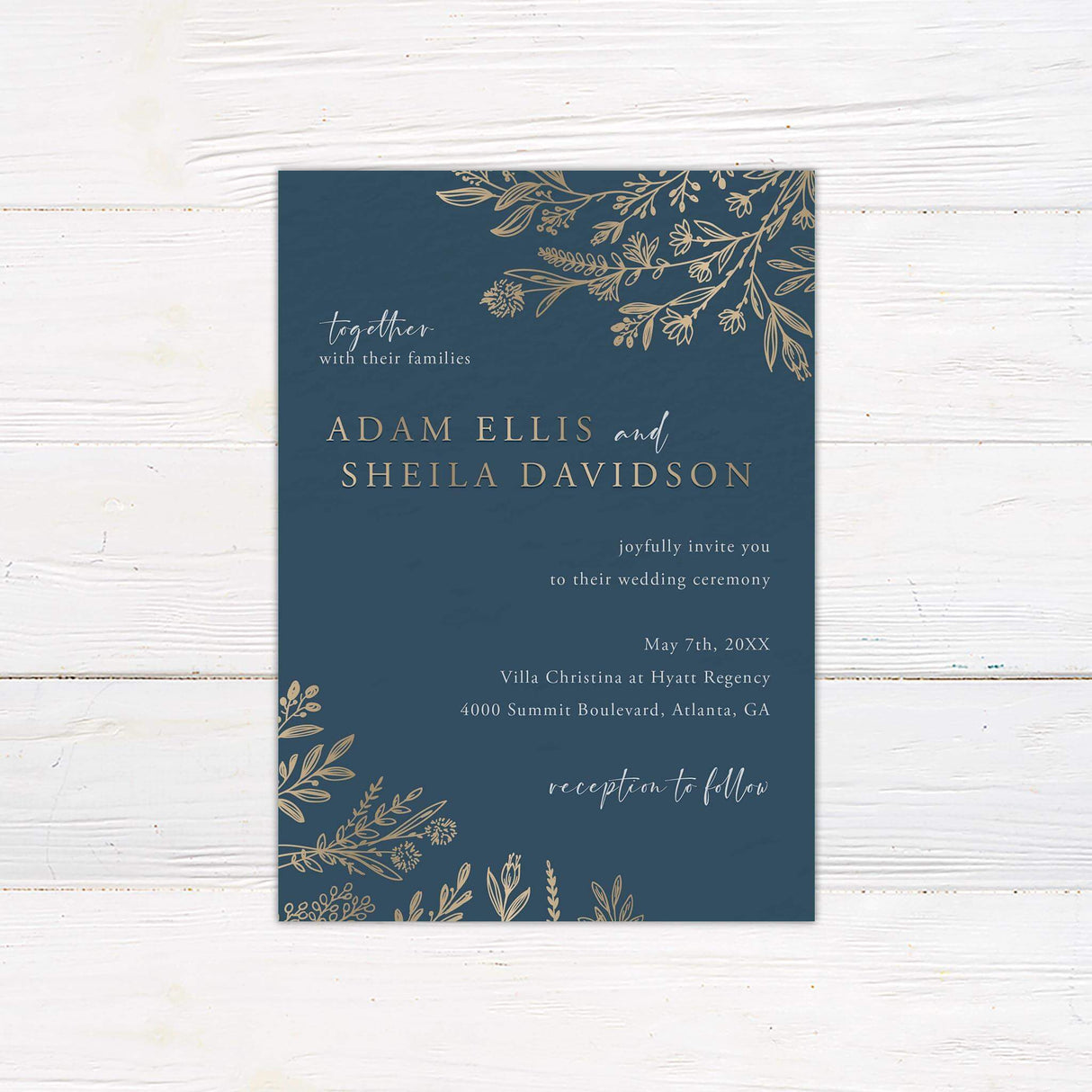 Navy and gold wedding invitation with elegant floral corner illustrations, gold serif text, and white handwritten script on a dark blue background