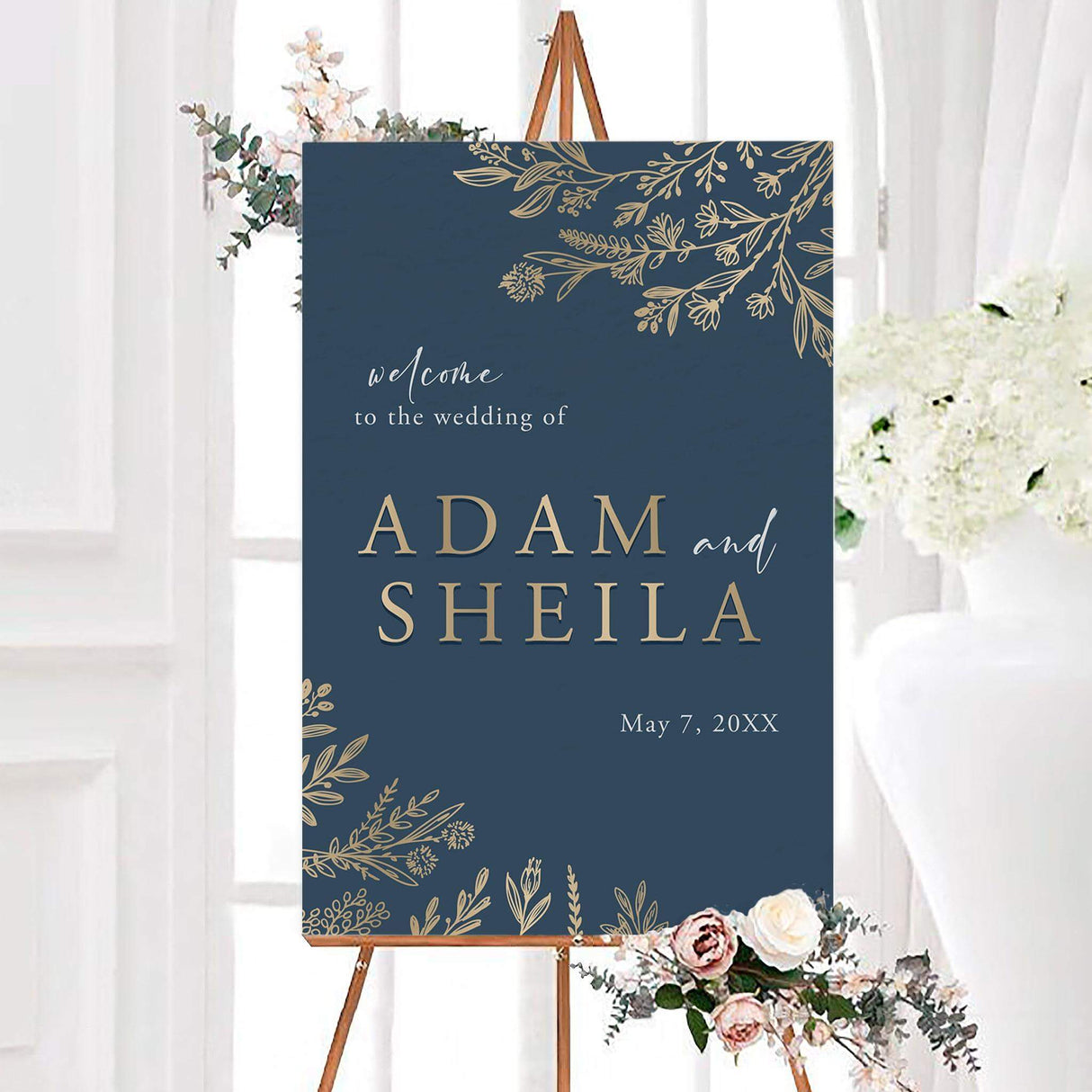 Elegant navy and gold wedding welcome sign with a navy background, botanical line art, and personalized couple’s names. The design includes flowing script, classic lettering, and the wedding date.