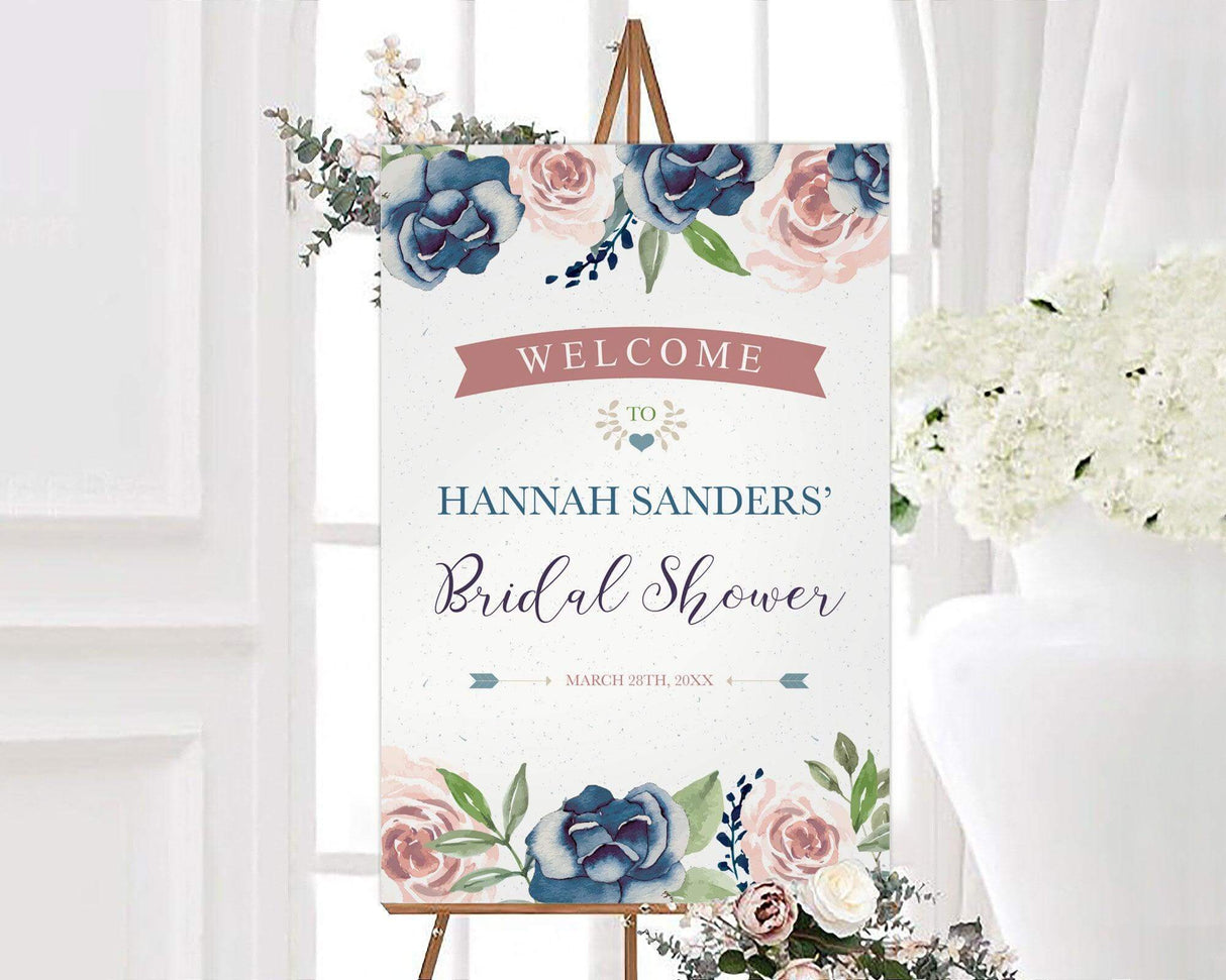 A navy and pink roses bridal shower sign with navy and blush watercolor roses. The design features soft flowers surrounding elegant text.