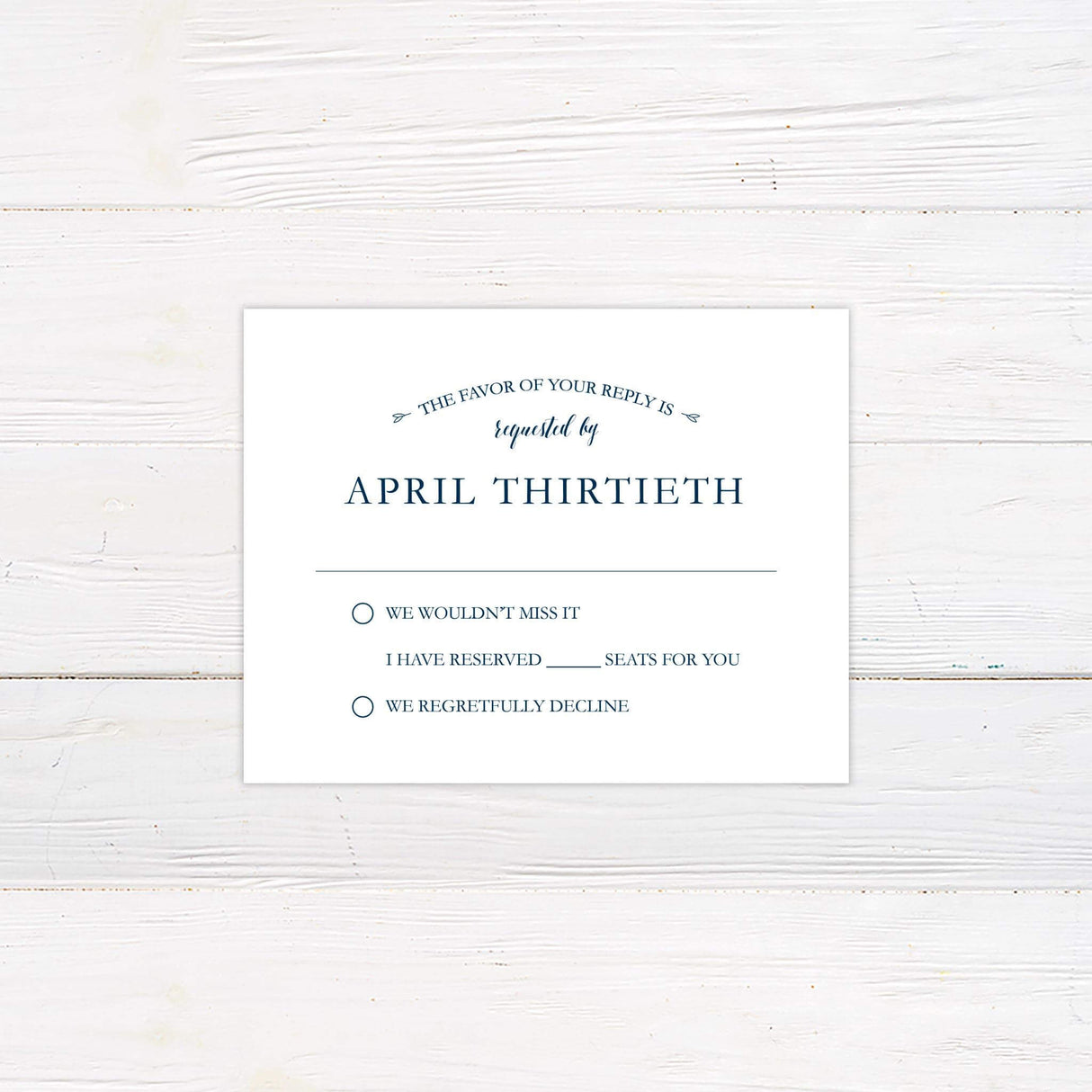 RSVP card with navy script and serif fonts on white background, coordinating with classic wedding invitation suite