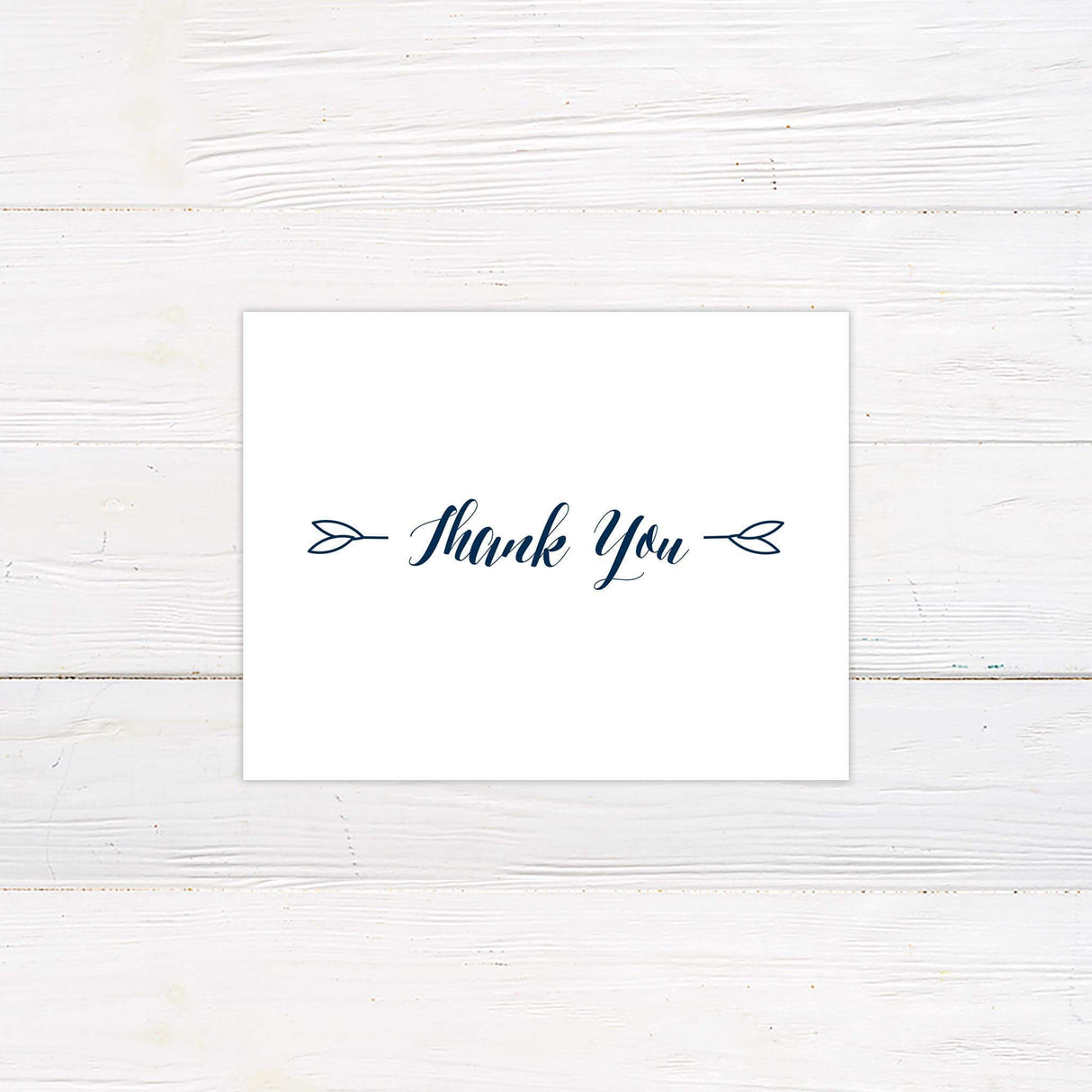 Thank you card with navy handwritten script on white background, elegant and timeless for a coordinated stationery set