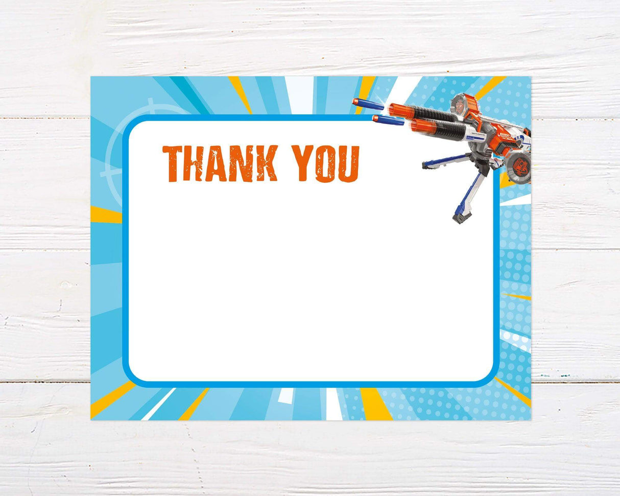 A colorful thank-you card features a bold red “THANK YOU” text at the top left, paired with a large toy blaster graphic on the top right corner. The design uses a clean white background, perfect for customizing with a child's name or message, with a red gradient border adding a fun, action-packed theme.