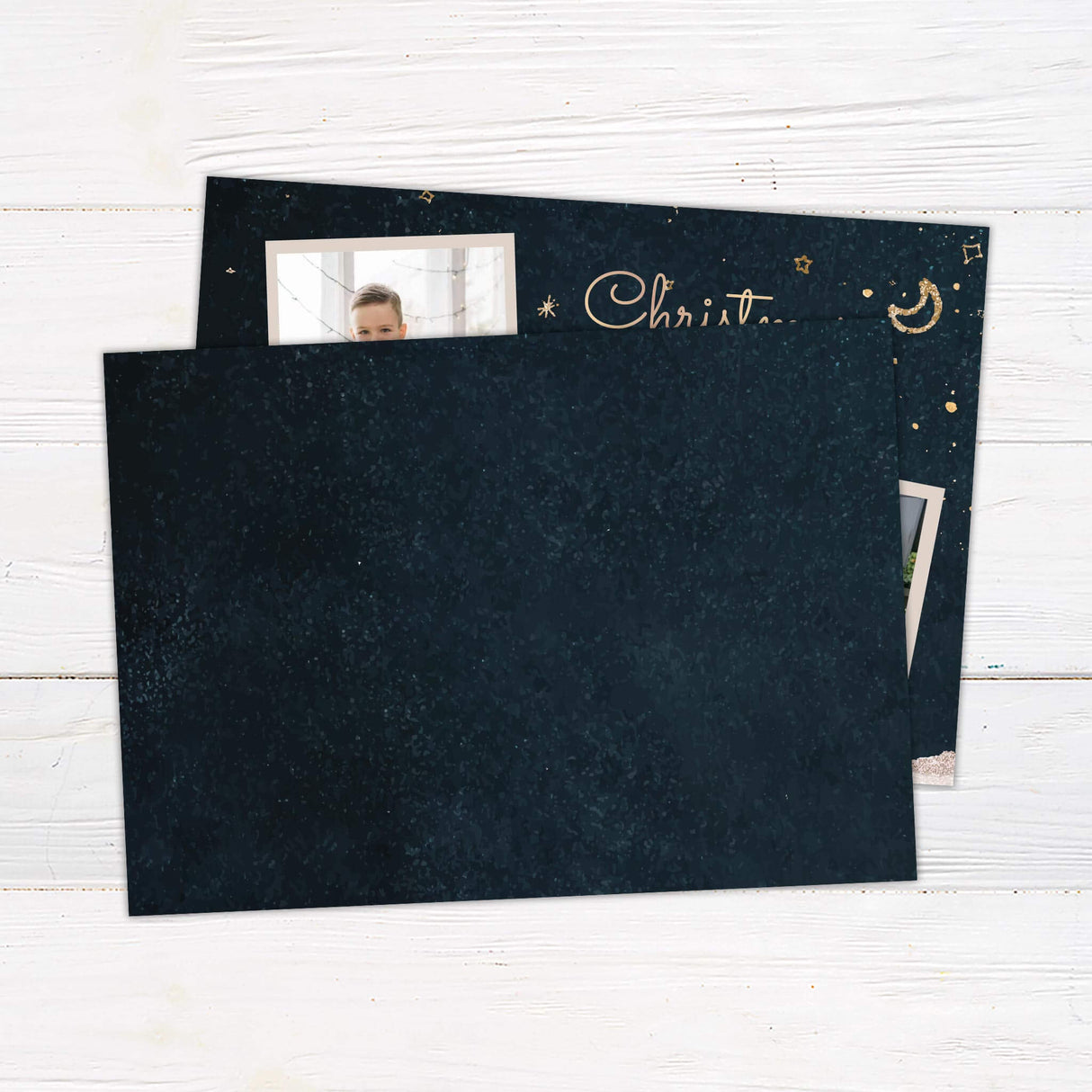 A night sky-themed holiday card with golden stars and a crescent moon, featuring two photo frames and a custom family greeting. Elegant and festive design. - back.