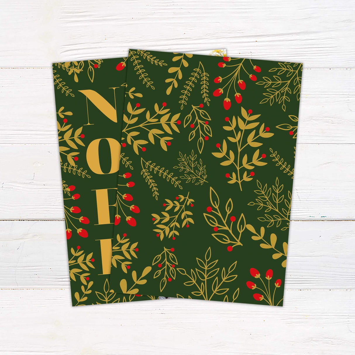 A Christmas card design featuring the word Noel in gold letters with festive greenery and berries, paired with family photos. A cheerful holiday greeting card. - back.