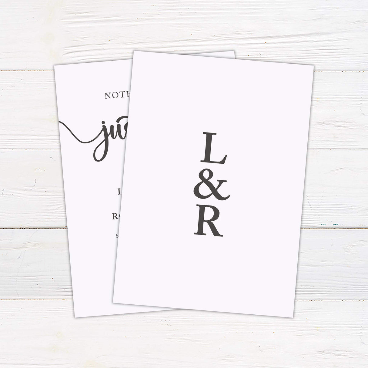 Casual wedding invitation with “Nothing Fancy Just Love” in large script and clean serif fonts on a neutral background.- back side
