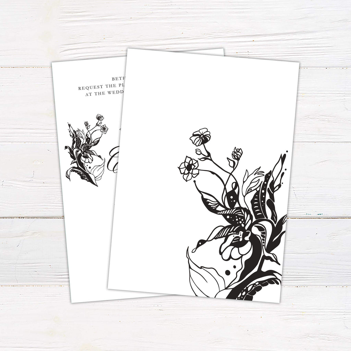 Black and white wedding invitation with vintage floral illustrations and elegant script font for names, in Art Nouveau style.- back side