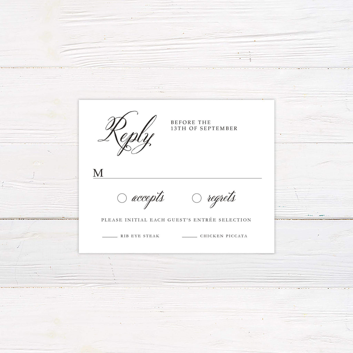 Coordinating RSVP card with vintage black floral accents and traditional serif typography.