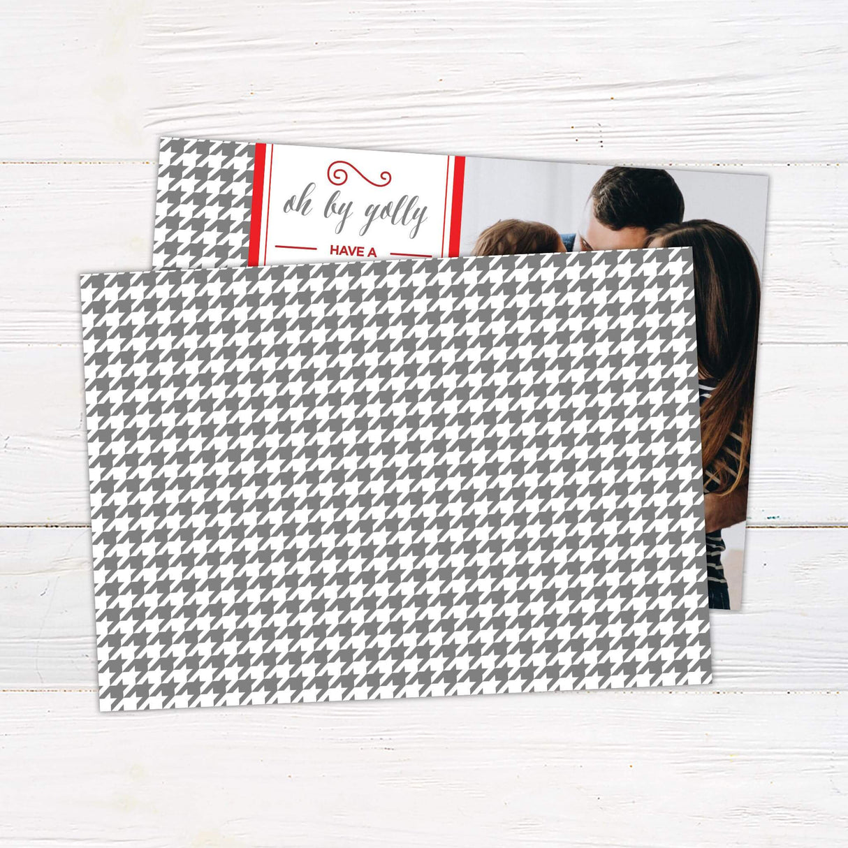 A Christmas card featuring the phrase “Oh by golly, have a holly jolly Christmas this year” with a family photo. A festive and customizable holiday design. - back.