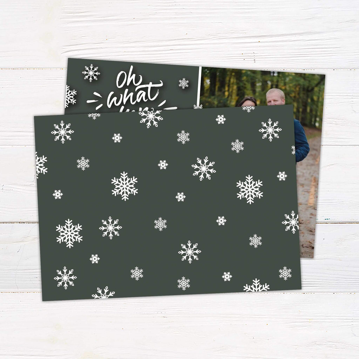 A holiday card with the phrase “Oh What Fun” and snowflakes, featuring a collage of family photos. A festive and customizable Christmas card design. - back.